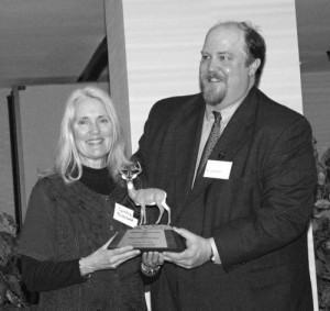 Swan Trust President, Cynthia Rorhbach, accepts the award from TWF President Tom Scott. 